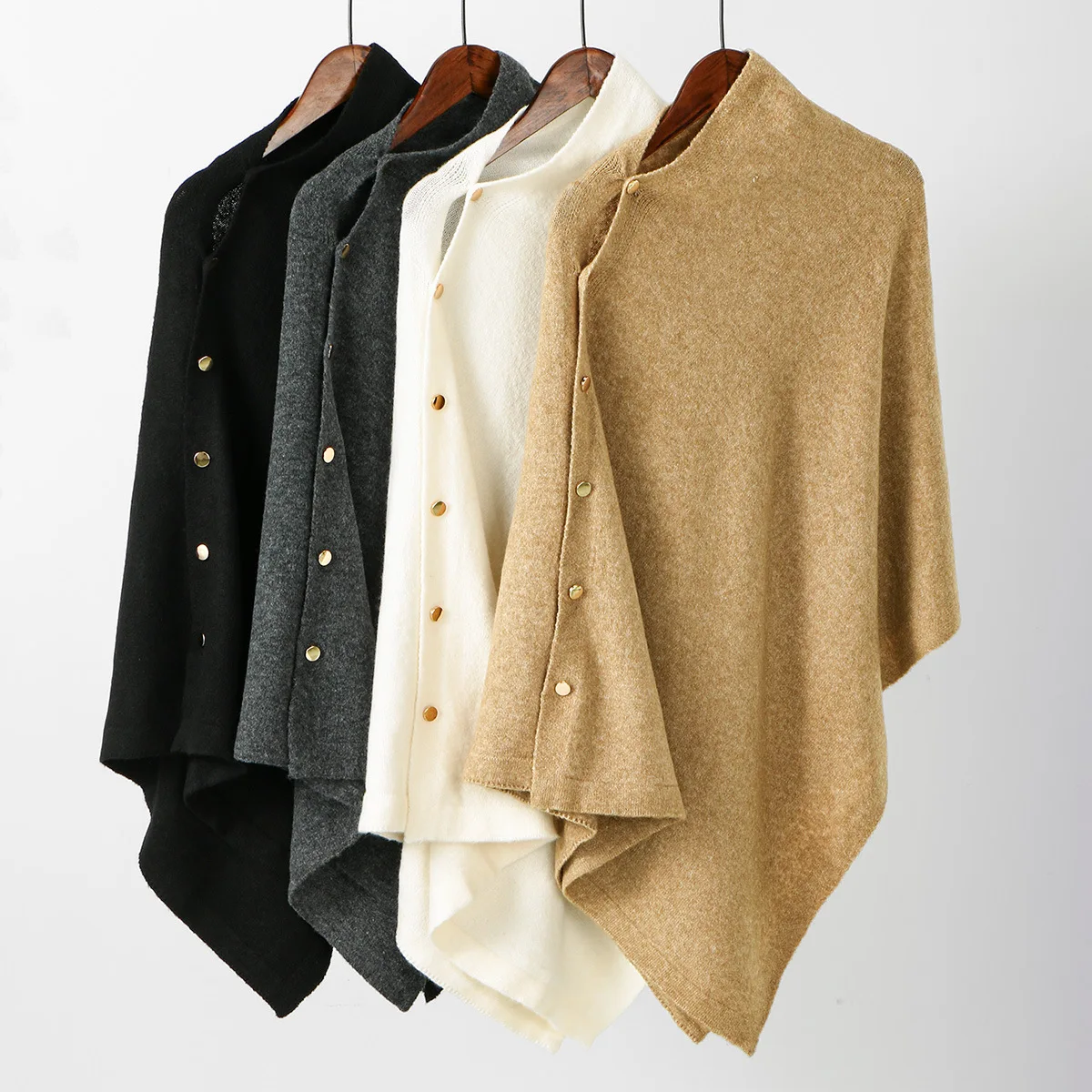 

Autumn and winter new solid color oblique cape shawl coat women's button decoration irregular women's loose outer cape