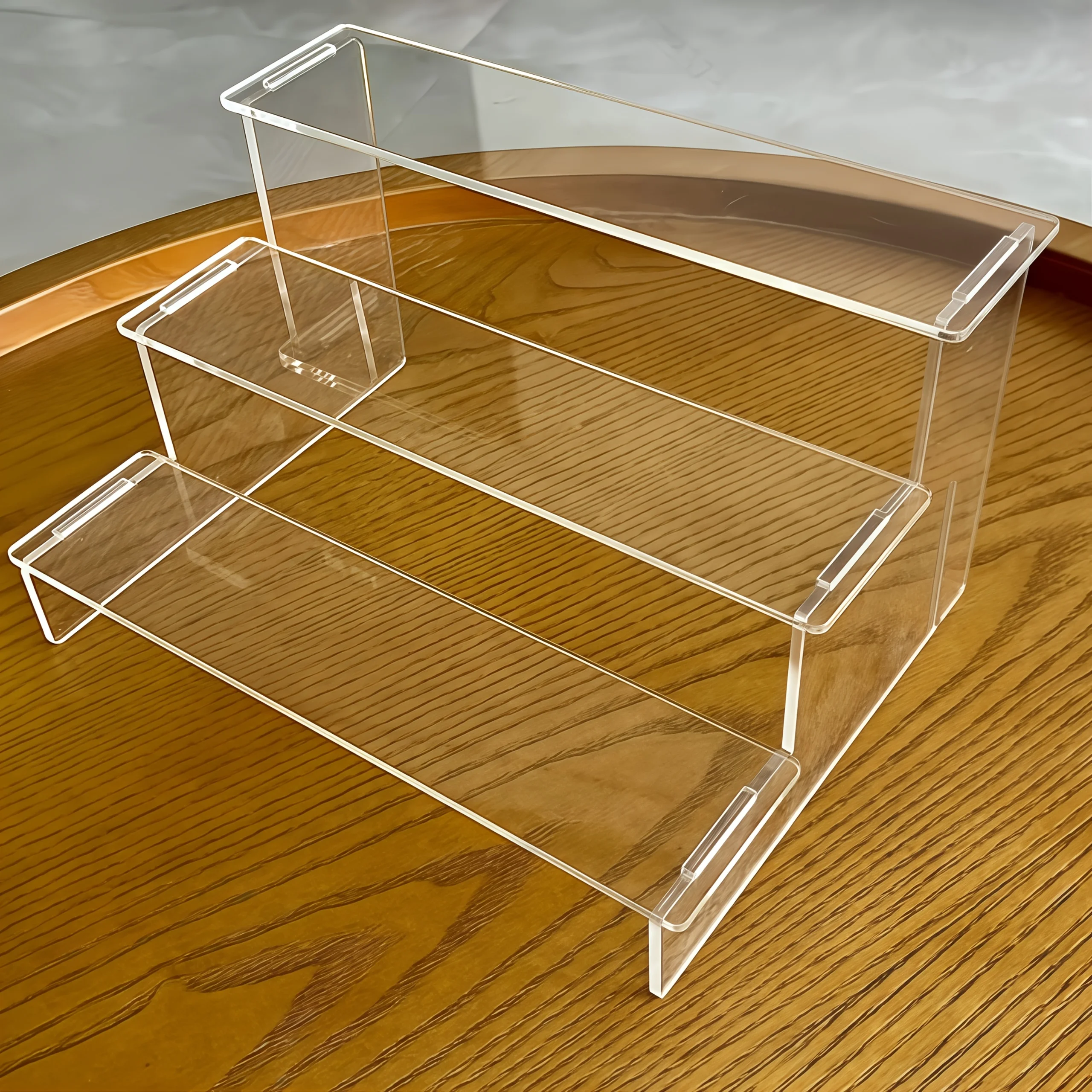 

3-Tier Acrylic Display Stand, 27" Modern Organizer for Collectibles, Office & Retail. Minimalist Design, Sturdy & Space-Saving.