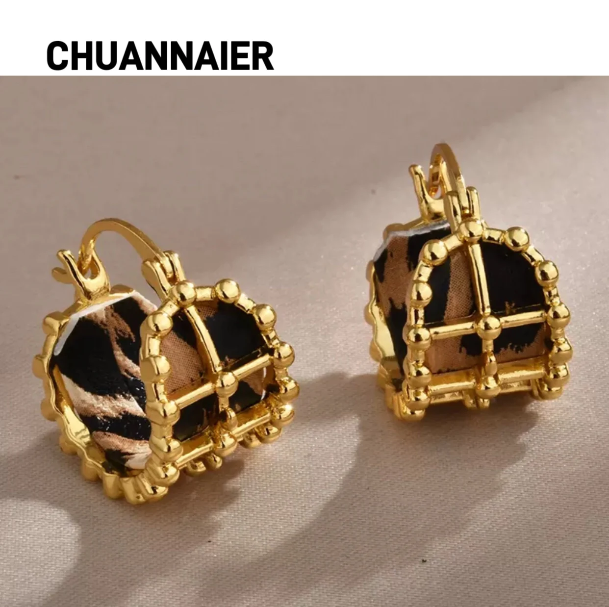 

Bestseller retro unique design perforated leopard leather ear clip fashion simple luxury temperament earrings versatile earring