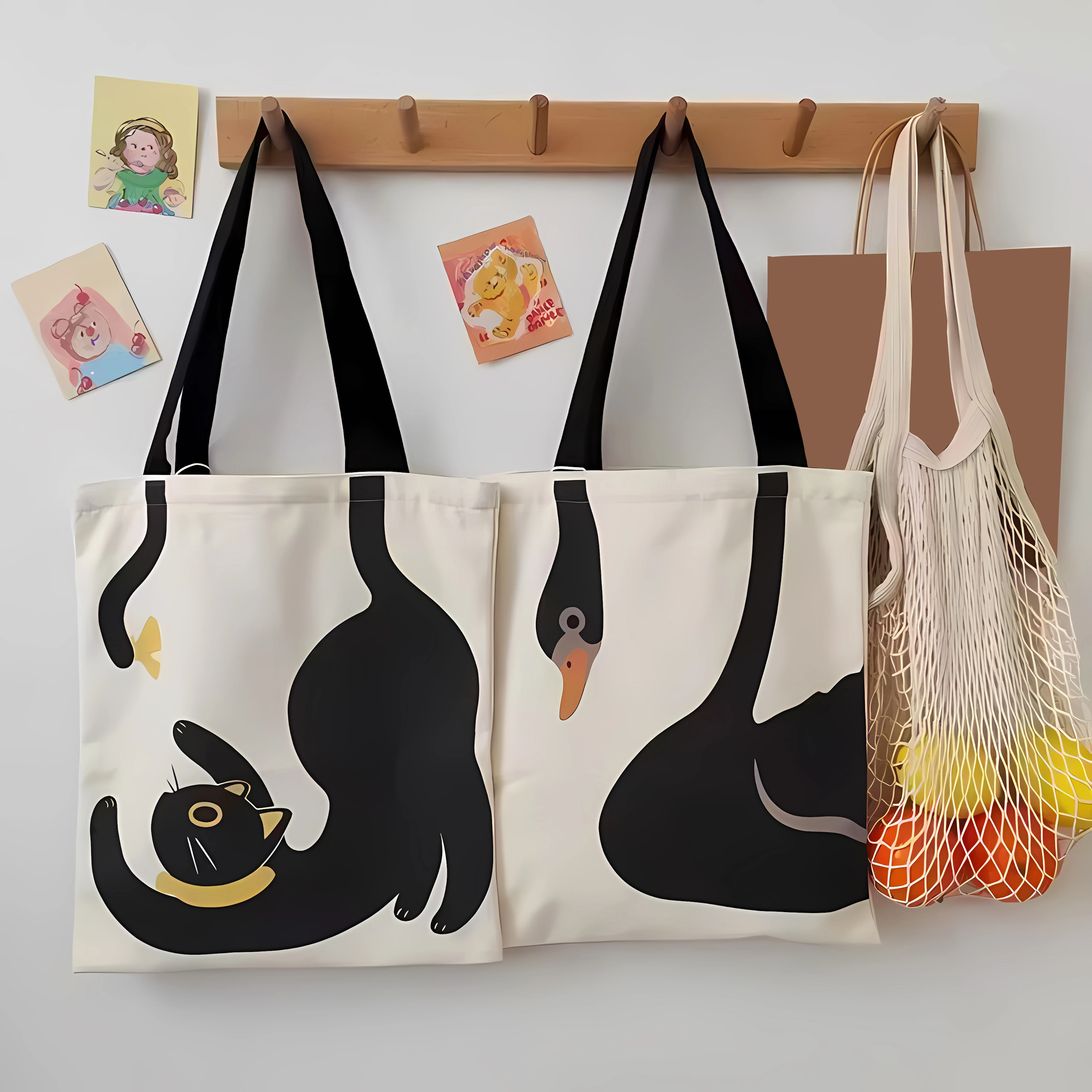 

A handbag with a cat pattern or a swan pattern, a fashionable and reusable handbag, a multi-functional handbag