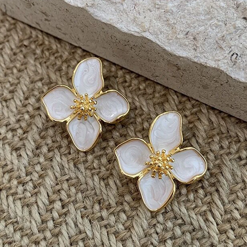 Pendientes de flor de aceite de esmalte blanco para mujer, aretes colgantes florales con temperamento de Metal elegante para fiesta, joyería dulce para plantas de fiesta