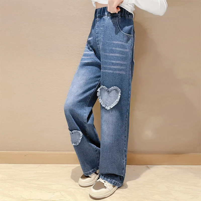 Celana panjang anak-anak celana kaki lebar Denim perempuan remaja Fashion baru celana Jeans anak perempuan pola cinta musim semi musim gugur pakaian anak-anak 5-14 tahun