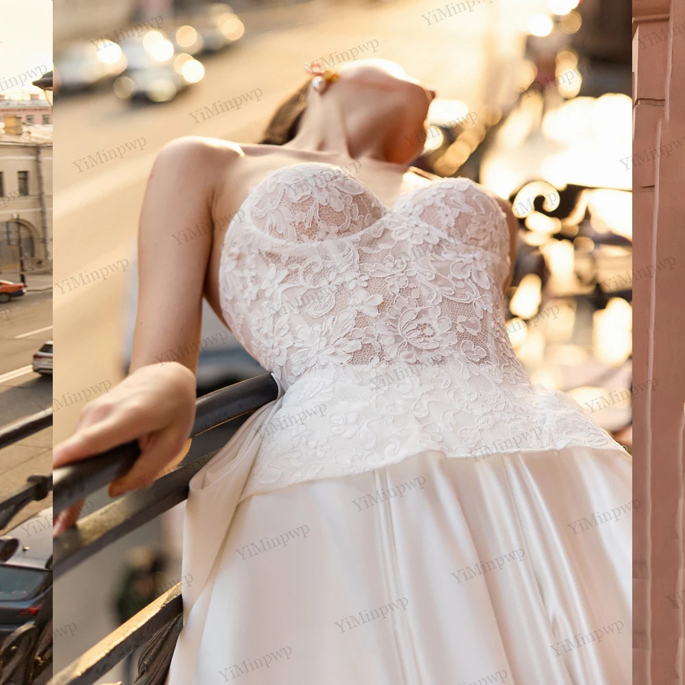 فساتين زفاف عتيقة مع فيونكة بدون حمالات على شكل حرف a فيستدو دي نوفيا بودا مزينة بدون أكمام وأربطة فساتين العروس حسب الطلب