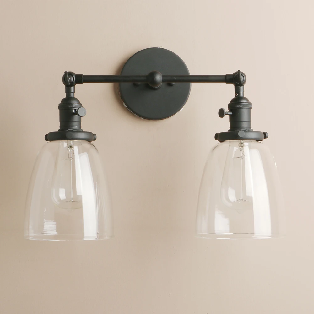 Luminária de parede industrial estilo vintage Permo com 2 luzes e sombra de vidro transparente de cone oval de 5,6 polegadas