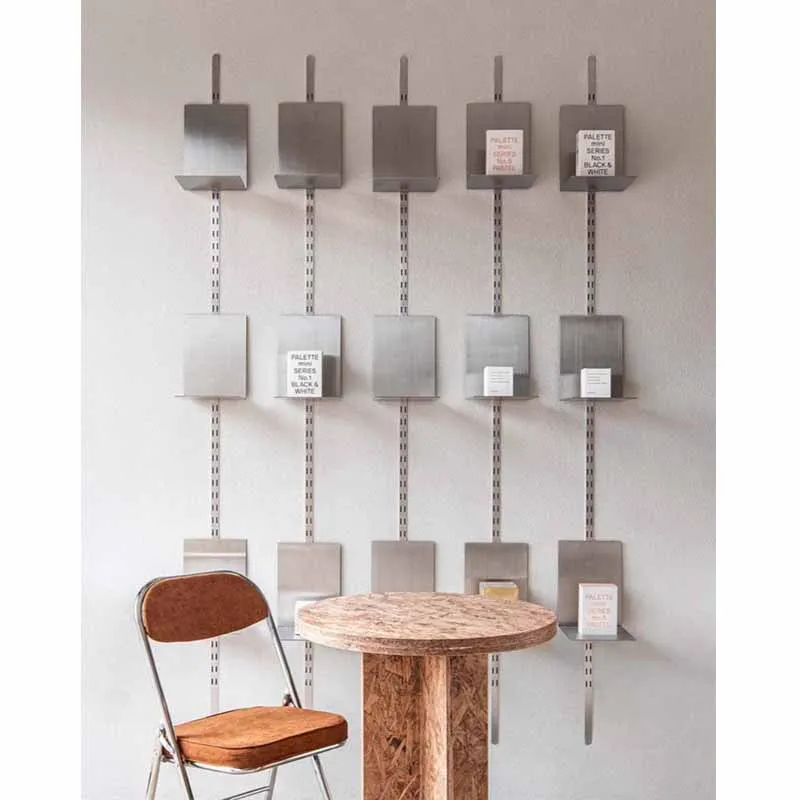 

Simple wall-mounted display stand Metal wall rack Adjustable design Decorative rack Creative wall-mounted magazine rack