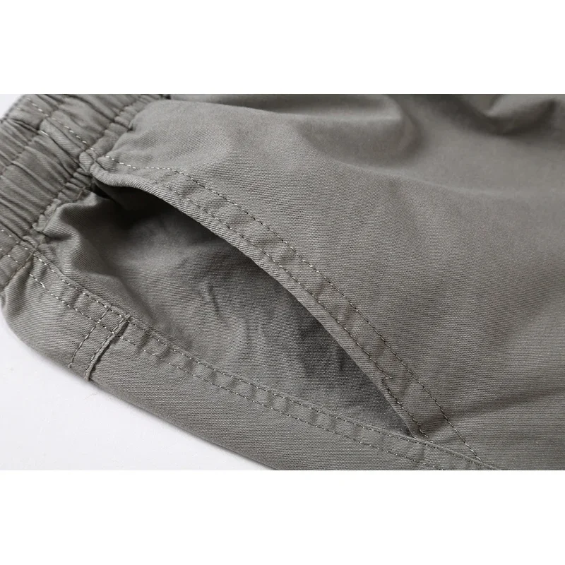 Pantaloni kaki da uomo estivi di grandi dimensioni vestibilità dritta taglie grandi 5XL tasche laterali pantaloni cargo neri in cotone a gamba larga pantaloni da lavoro maschili