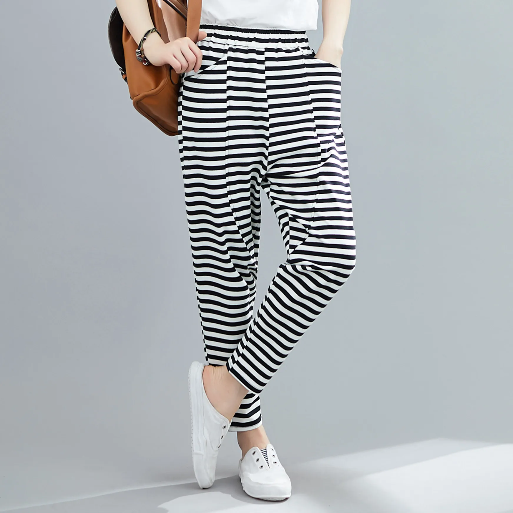 

Женские повседневные спортивные брюки больших размеров, свободные брюки в полоску для похудения с эластичной резинкой на талии, девятисекционные брюки с манжетами, универсальные брюки Харлан