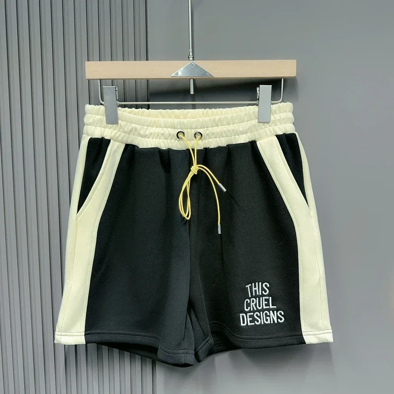 Color Blocked Yellow Drawstring Metal Hole Loose Casual Sports Shorts for Men and Women