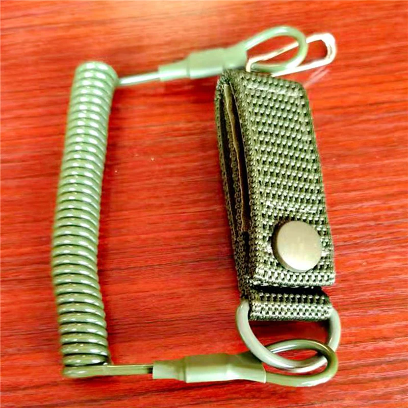 Cordón elástico táctico antipérdida, correa de seguridad de resorte militar, cuerda de pistola para llavero, cadena, linterna, accesorios de caza