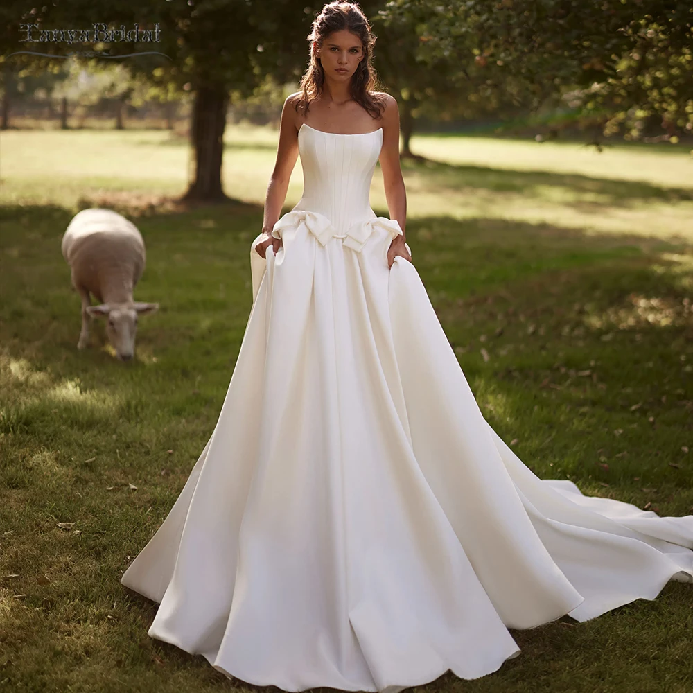 

Strapless Satin A Line Wedding Dresses ,Volume Princess Puffy Skirt With Train ,Bridal Gowns With Bow At Waist DW1078
