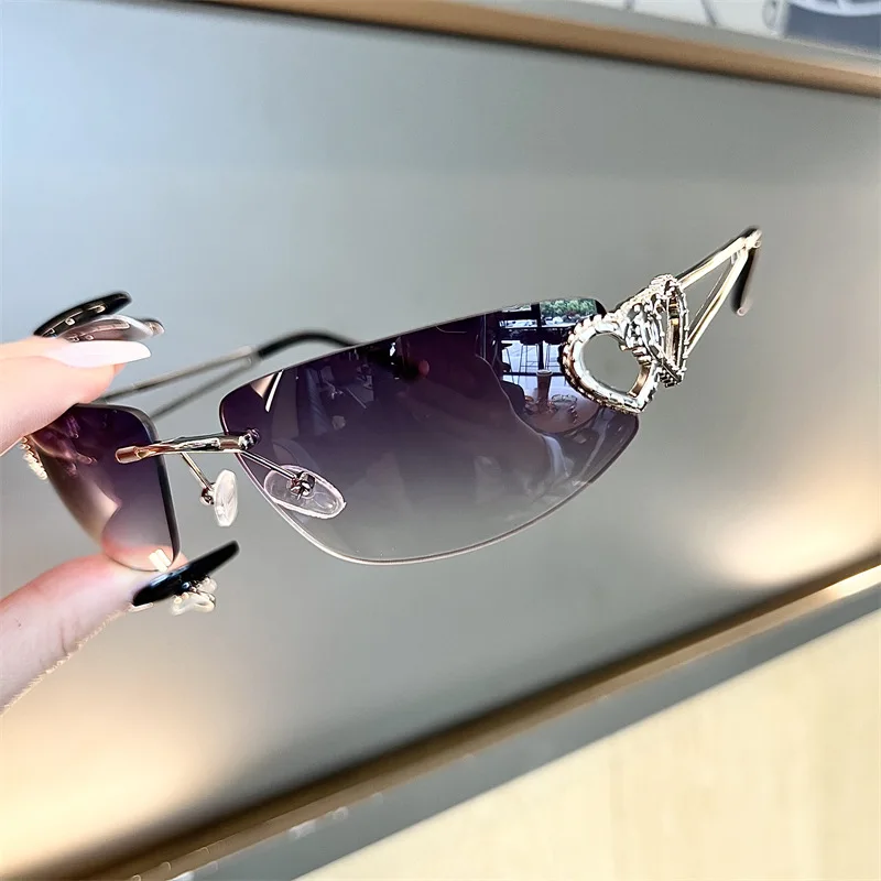 New Oval Cat Eye Frameless Mercury Sunglasses With Heart-Shaped Metal Hollow Out Y2K Sweet and Cool Hot Girl Sun Glasses - view 4