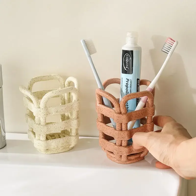 

Porcelain Toothbrush Holder for Bathroom, Hollow Ceramic Toothpaste Holder Makeup Brush Storage Basket Desktop Storage Basket