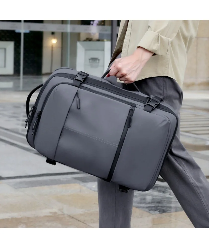 Black expandable business laptop backpack multi compartment design adjustable compression straps water resistant fabric suitable