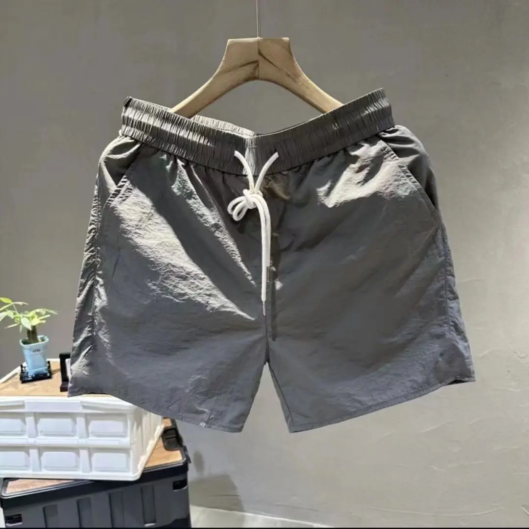 ファッションブランド夏のスリークォーターパンツショートパンツ男の子用速乾性通気性カジュアルルーズ薄いスタイル固体トレンディなブランド