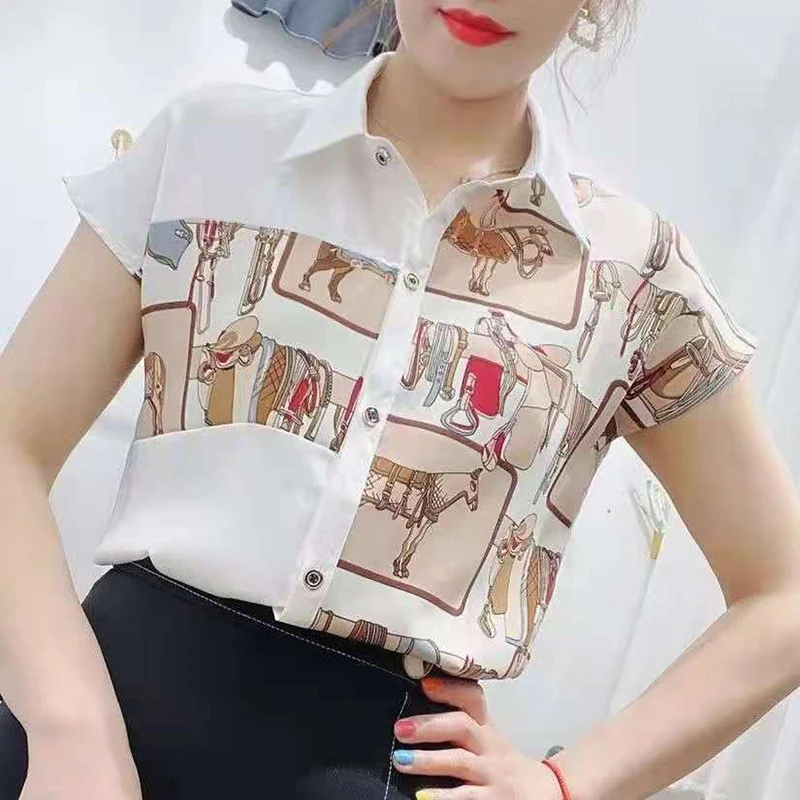 Mode revers bouton ample imprimé chemise asymétrique vêtements pour femmes 2025 été nouveaux hauts décontractés en mousseline de soie bureau dame Blouse