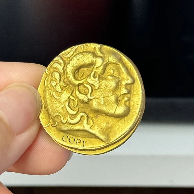 The ancient Greek gold two horned god Alexander the Great bull coin, adorned with pendants and decorations,collection gift