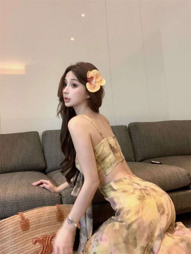 Damska letnia spódnica maxi z wysokim stanem, wyszczuplająca, w stylu koreańskim, z kwiatowym nadrukiem, o kroju litery A, idealna na co dzień i do pracy, kolekcja lato 2025.