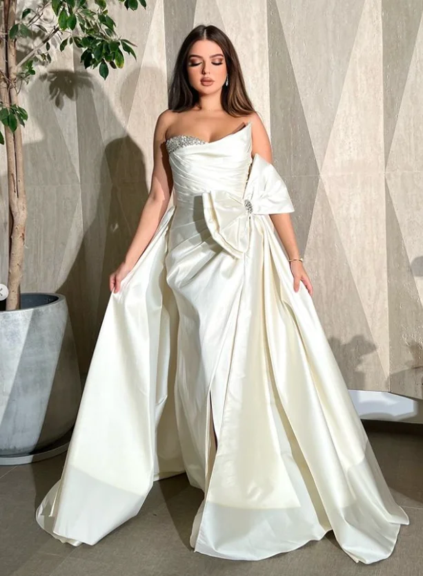 PersonalizadoExquisito clásico estilo moderno Jersey con lentejuelas arco plisado acanalado A-line vestidos largos sin tirantes vestidos de quinceañera Fash