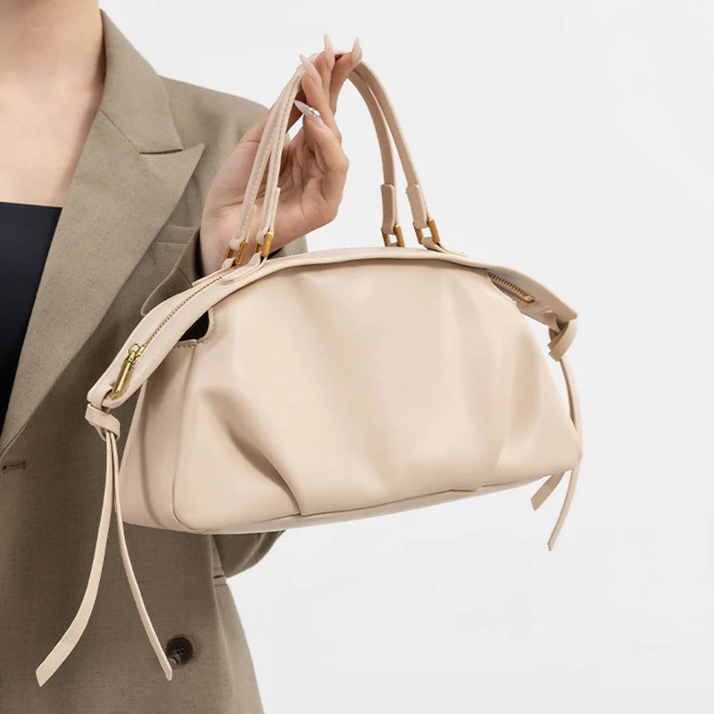 

Новые женские сумки, модные и простые сумки, нишевые высококачественные сумки на ремне, универсальные повседневные сумки для поездок на работу, сумки-тоут большой вместимости, сумки через плечо из мягкой кожи