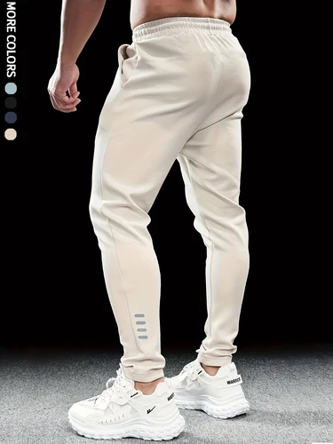 Pantalones deportivos informales para hombre, diseño sencillo de tiras reflectantes para piernas, cinturilla elástica, adecuado para uso diario, correr, multiescena