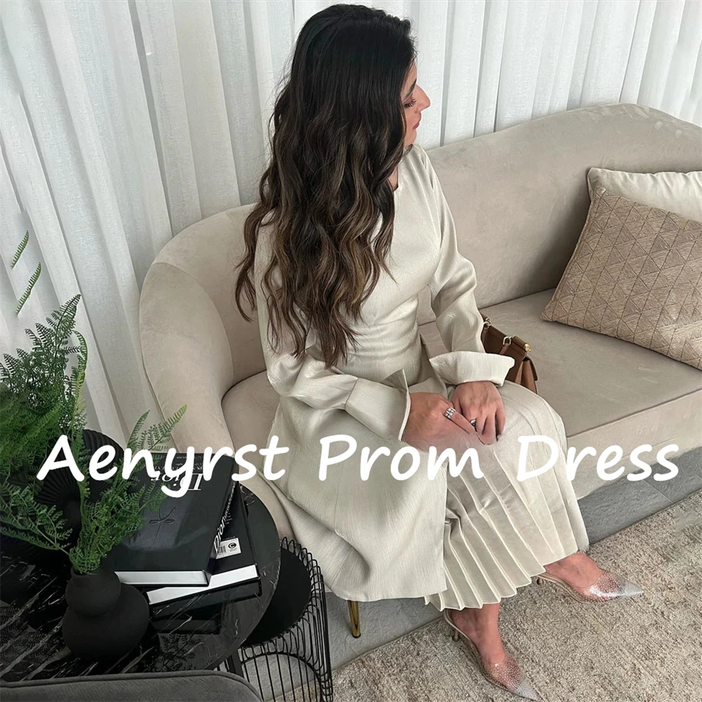 ชุดราตรีแขนยาวทรงเอไลน์ จับจีบ ยาวระดับชา  แบบใหม่ สำหรับงานพรอม งานเลี้ยง  แบรนด์ Aenyrst ซาอุดิอาระเบีย  ดีไซน์หรูหรา  สำหรับผู้หญิง