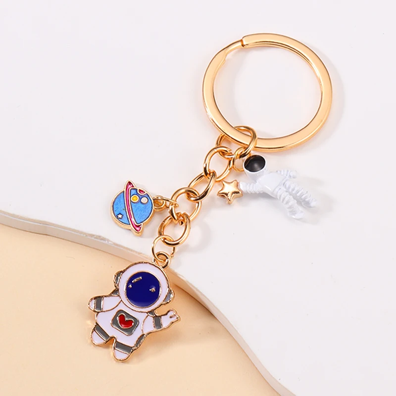 2023 Trendy Enamel Universe Planet Earth Key Chains Cute Astronaut Pendants Keychain For Men Boys Backpack Car Key Decor Jewelry