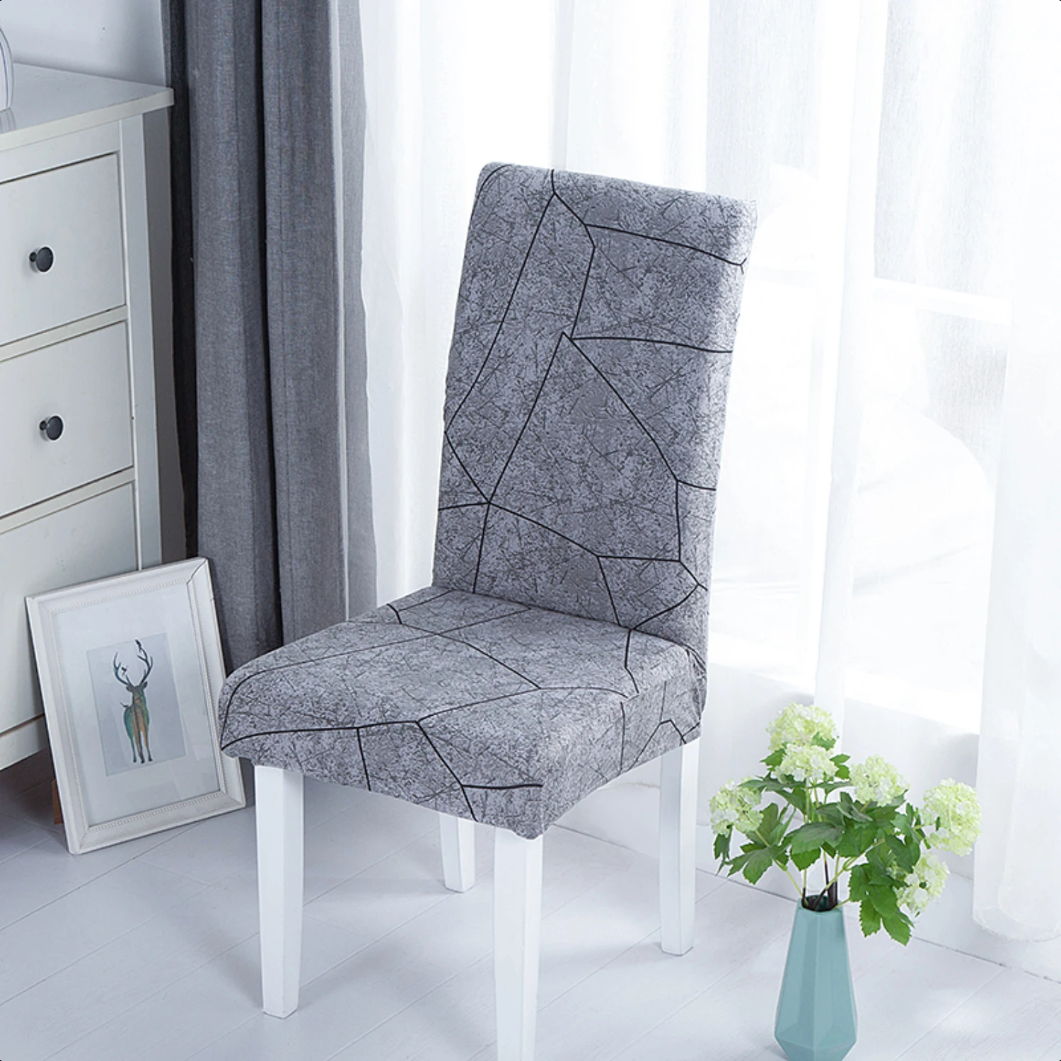 icated charm to your home decor, this luxurious chair slipcover is sure to impress guests and elevate the ambiance of any room. 