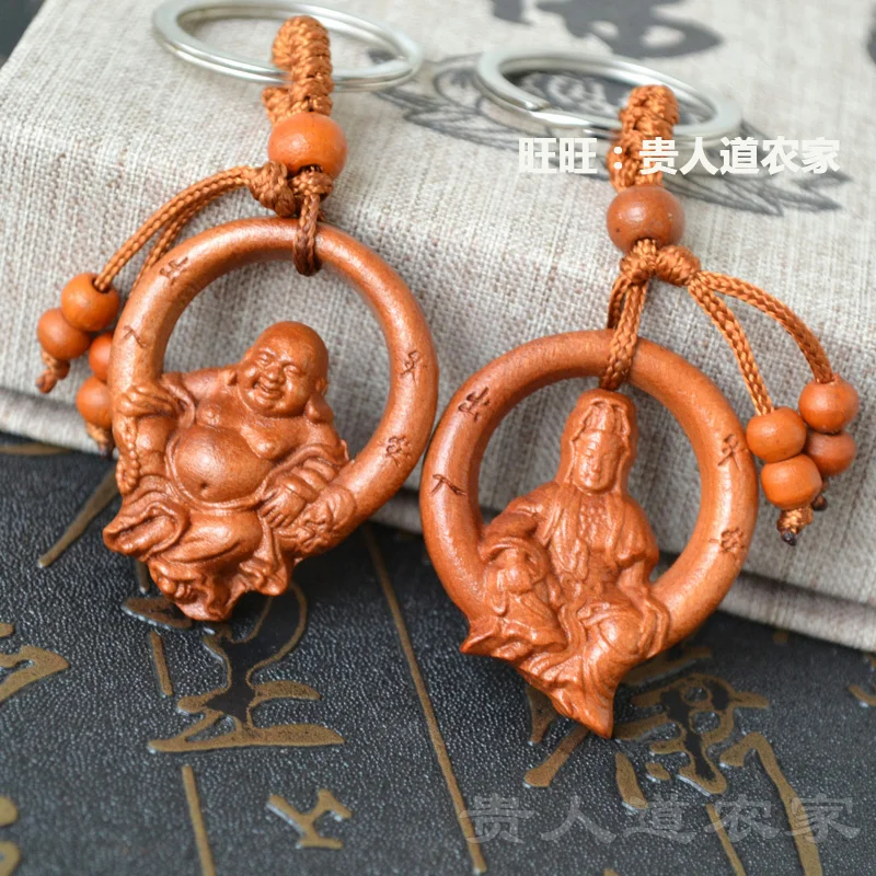 Carving carefree Guanyin car key chain mahogany pendant male portable key chain is auspicious.