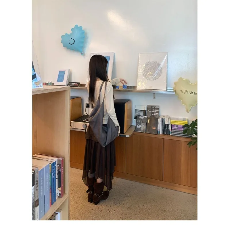 不規則な鹿革ベルベットカジュアルミッドレングススカート女性 2026 春ハイウエストソリッドカラーカジュアルメッシュステッチ A ラインスカート