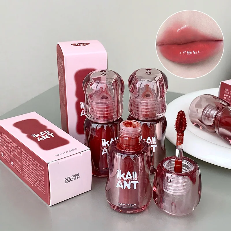 Crea colori bianchi con colori a specchio per labbra color olio, trucco umido, lucentezza trasmittata al ghiaccio, trucco labbra nella sensazione coreana di alta qualità, può abbinare con una varietà di trucchi. Adatto per la pelle gialla