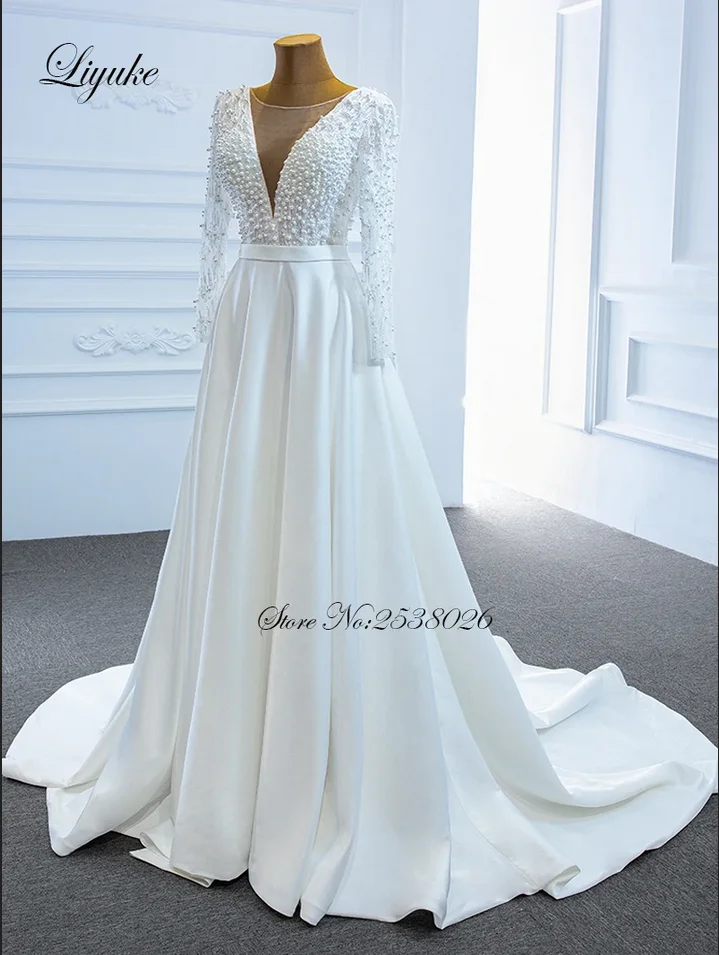 Liyuke Exquisite Pearls Long Sleeve A Line Wedding Dress Split With Deep V Neck Beads Corset Bridal Gown