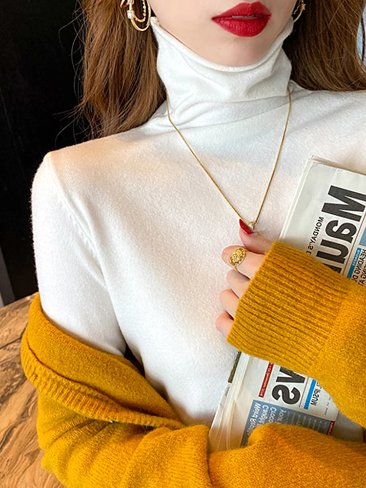 

Женская теплая модная одежда: уютный длинный топ с высоким воротником (без фирменной этикетки)