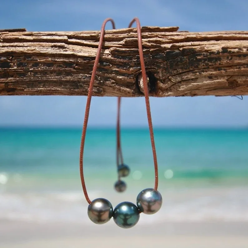 Versatile Necklace and Bracelet leather lariat strung with stunning Tahitian pearls  Barts pearl and leather necklace.