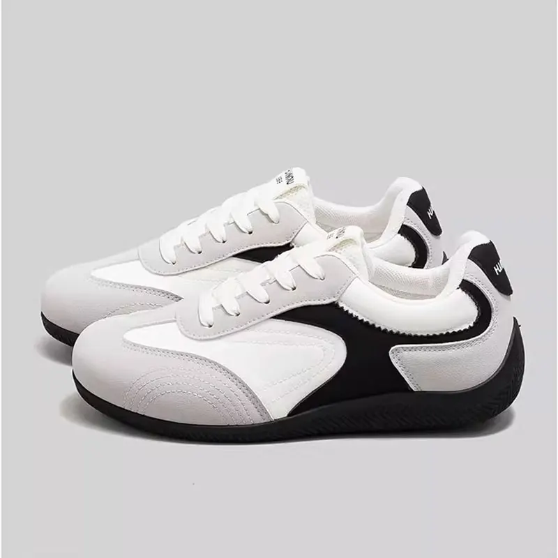 

A pair of black trendy niche men's shoes, four season new versatile sports and leisure shoes, height increasing board shoes
