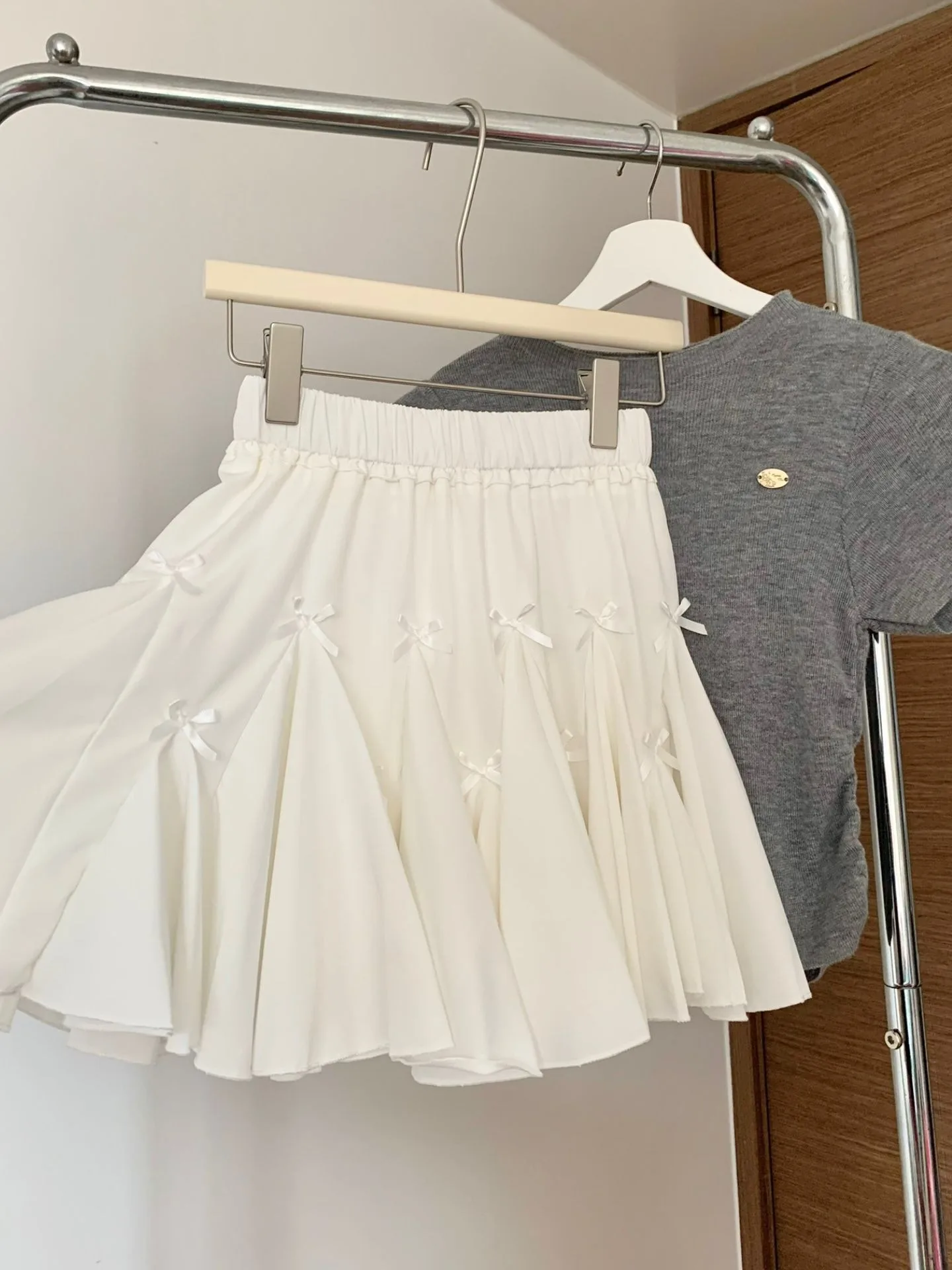 Skirts women 2025 casual Bow cake skirt sweet high waist slim lotus leaf border revealing A-line short skirts women's clothing