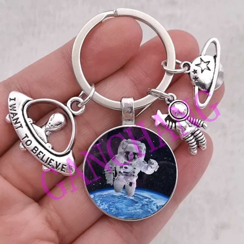 Astronaut keychain Outer Space Starry Galaxy keychain Solar System Planet Universe Glass Keychain UFO Key Ring Spaceman Keychain