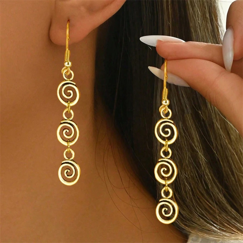 Pendientes colgantes en espiral de Metal Vintage para mujer, aretes largos con forma de remolino geométrico Simple, Piercing para oreja, accesorios de joyería
