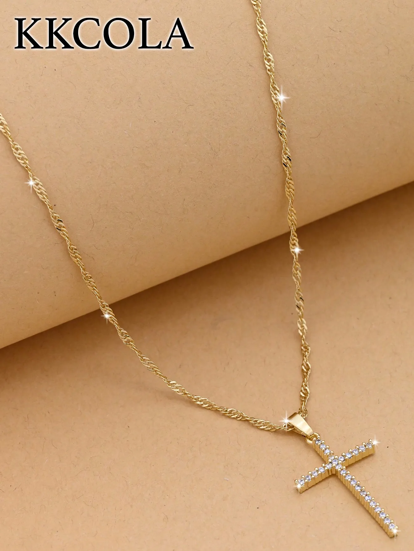 

Gold-Tone Twisted Chain Necklace with CZ-Embellished Cross Pendant