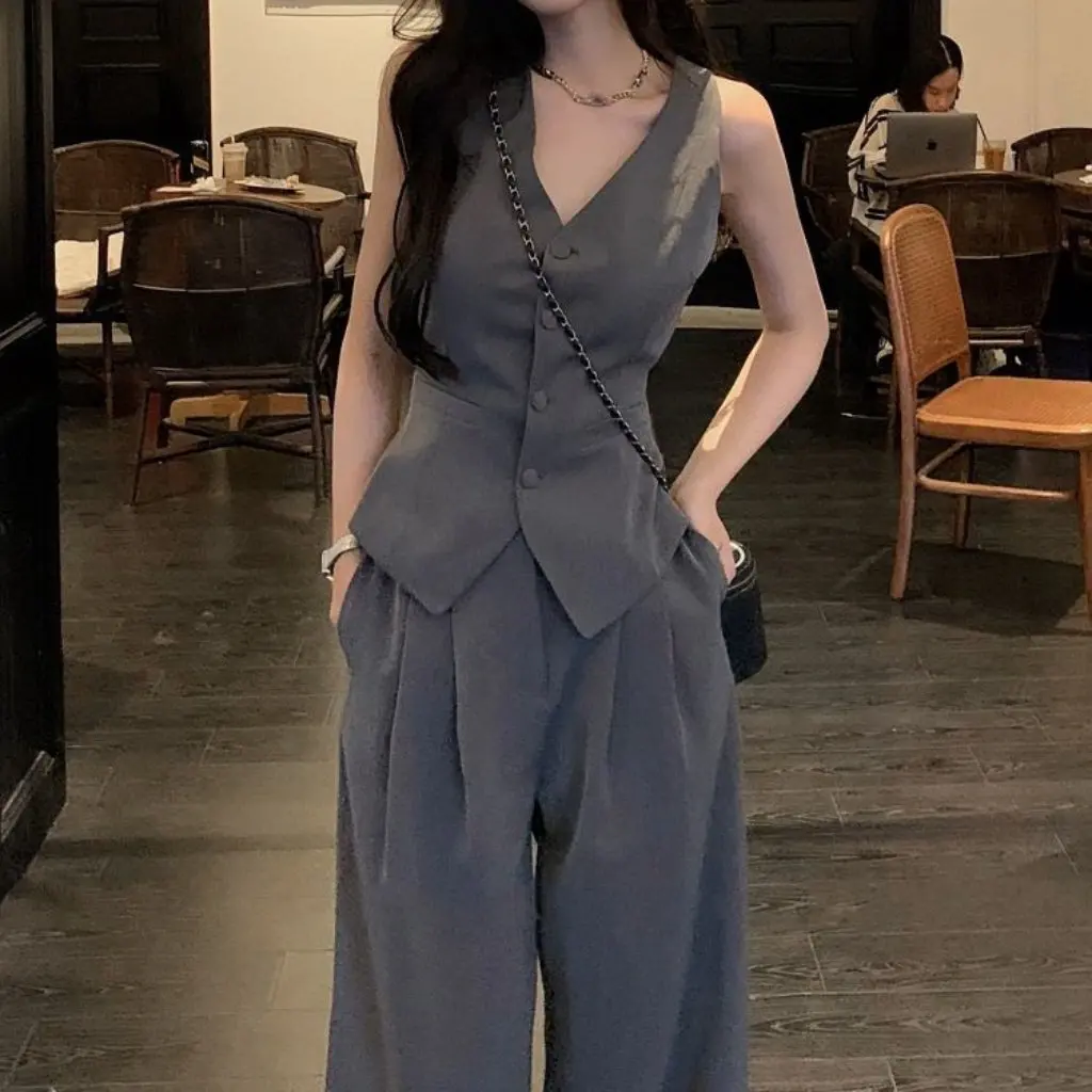 

Женский летний модный костюм, жилет и плиссированная короткая юбка, комплект из двух предметов, высококачественный топ без рукавов для модных нарядов