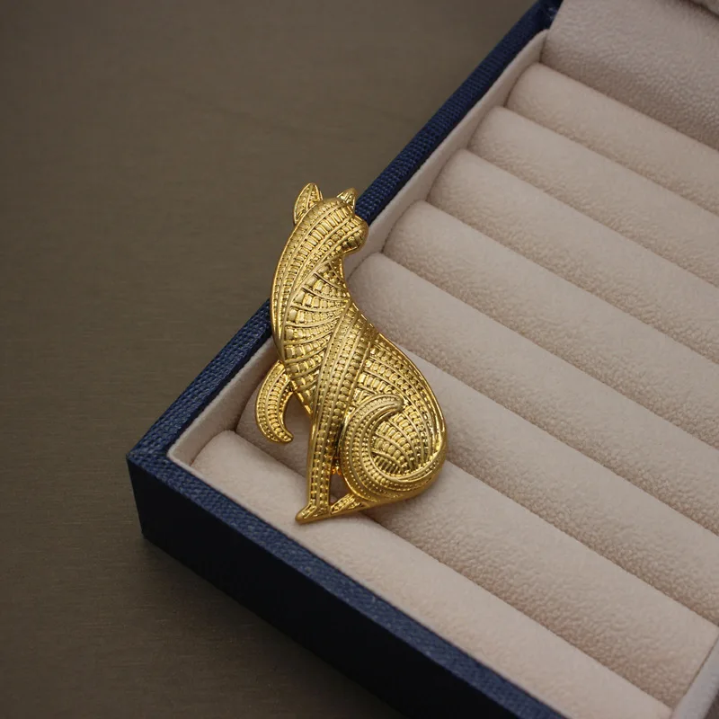 Abstract tiger cat brooch of medieval animals in Europe and America