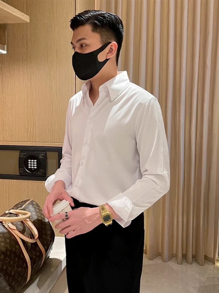 

Мужская приталенная рубашка с длинным рукавом для деловых поездок, модная, молодежная, из полиэфирного волокна, с воротником-стойкой, на пуговицах, однотонная