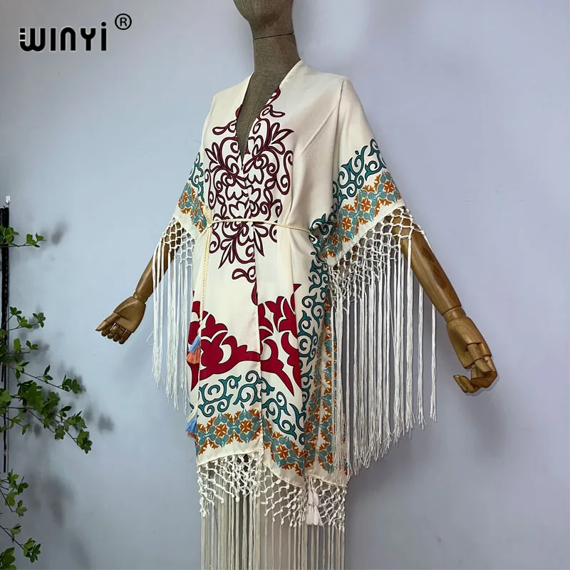 WINYI-quimono de manga comprida para mulheres, roupas de verão com estampa boho, cardigã elegante, vestido maxi sexy de férias, borlas