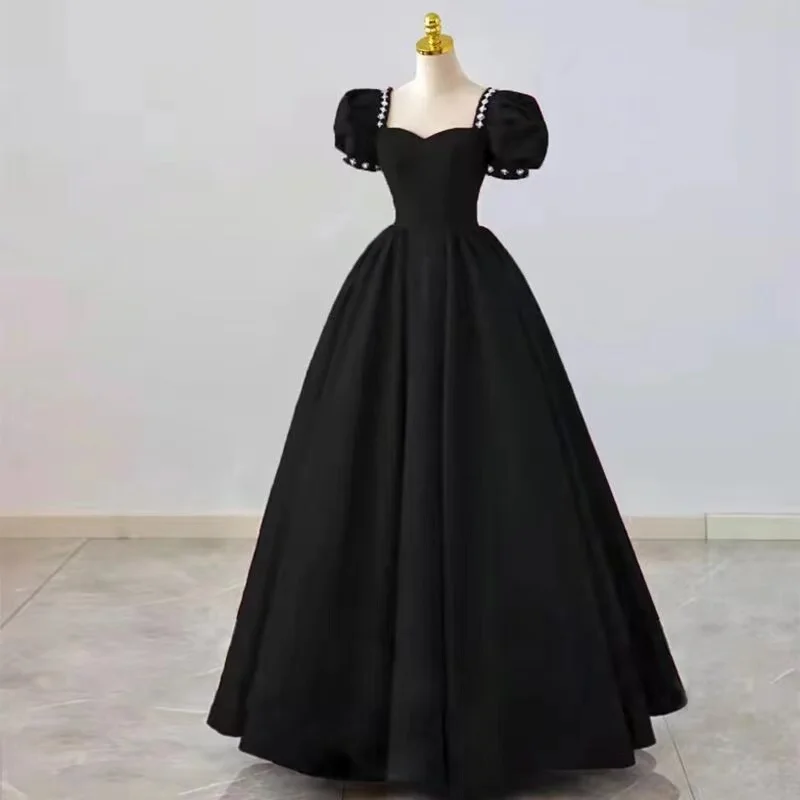 Vestido de fiesta de satén negro vintage Estilo francés Sin tirantes Manga abullonada Cuello cuadrado Una línea Vestidos de noche formales para fiesta de boda simple