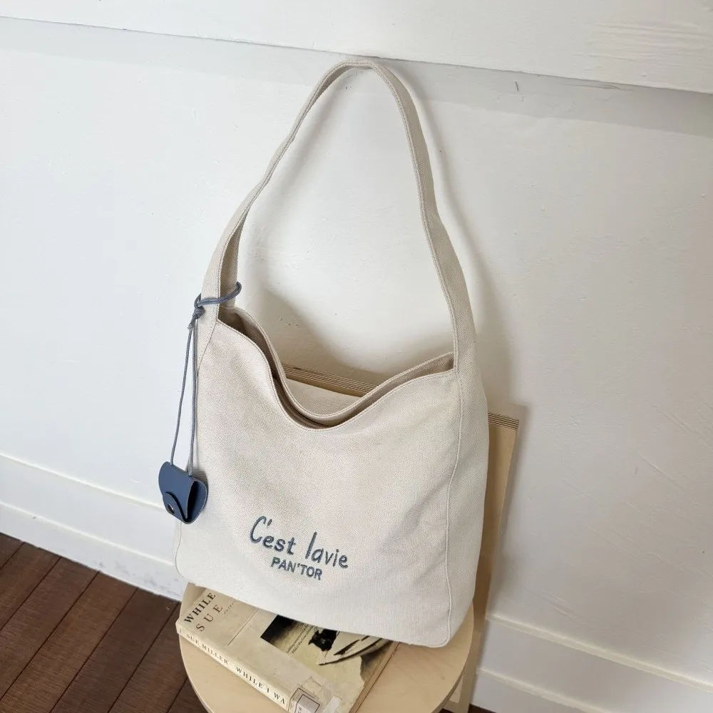 

Модная корейская сумка через плечо с буквенным принтом, парусиновая универсальная студенческая большая сумка, большая вместительная повседневная женская сумка подмышками для девочек