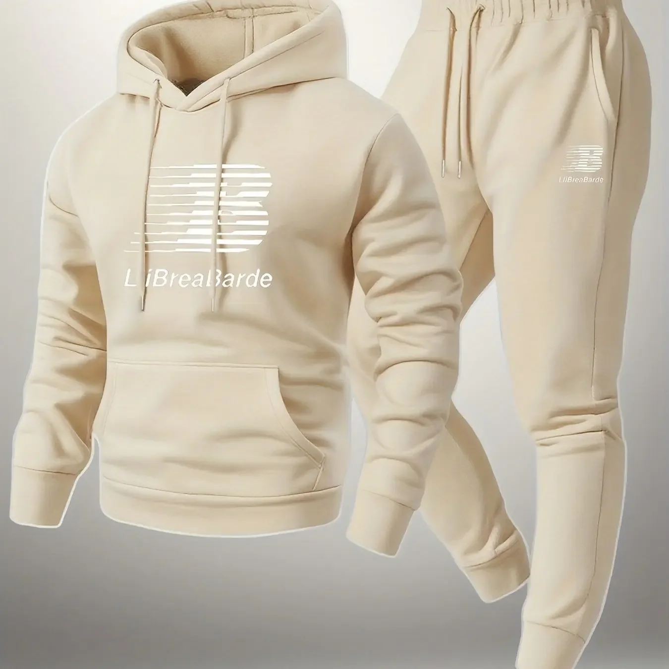 

A complete casual sportswear set, featuring a round neck and a printed design with letter patterns, is suitable for men to wear.