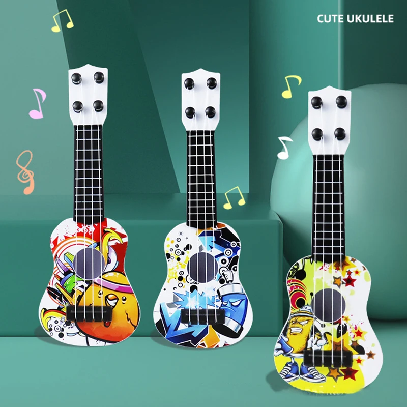 เด็กปริศนาของเล่นเครื่องดนตรีจําลองกีตาร์ Ukulele MINI สี่สายสามารถเล่นการศึกษาของเล่นของขวัญวันเกิด