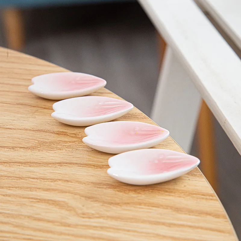 100pcs Creative Chopstick Holder Chopstick Pillow Spoon Holder Cherry Blossom Petal Chopstick Holder Japanese Ceramic Tableware view 2