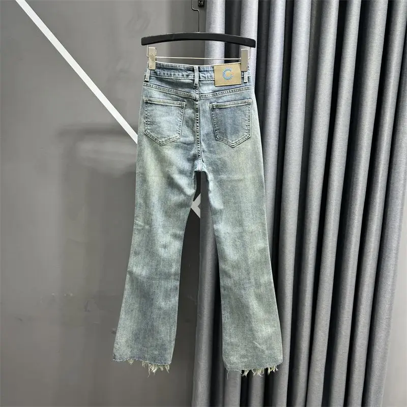 Personalized fringed denim micro flared pants for women autumn high waist slim fit simple versatile flared long pants