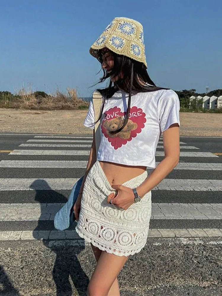 Mini-saia de crochê oco feminino, chique de cintura alta, vestidos curtos enrolados no quadril, senhora casual, moda praia, verão, sexy, branco