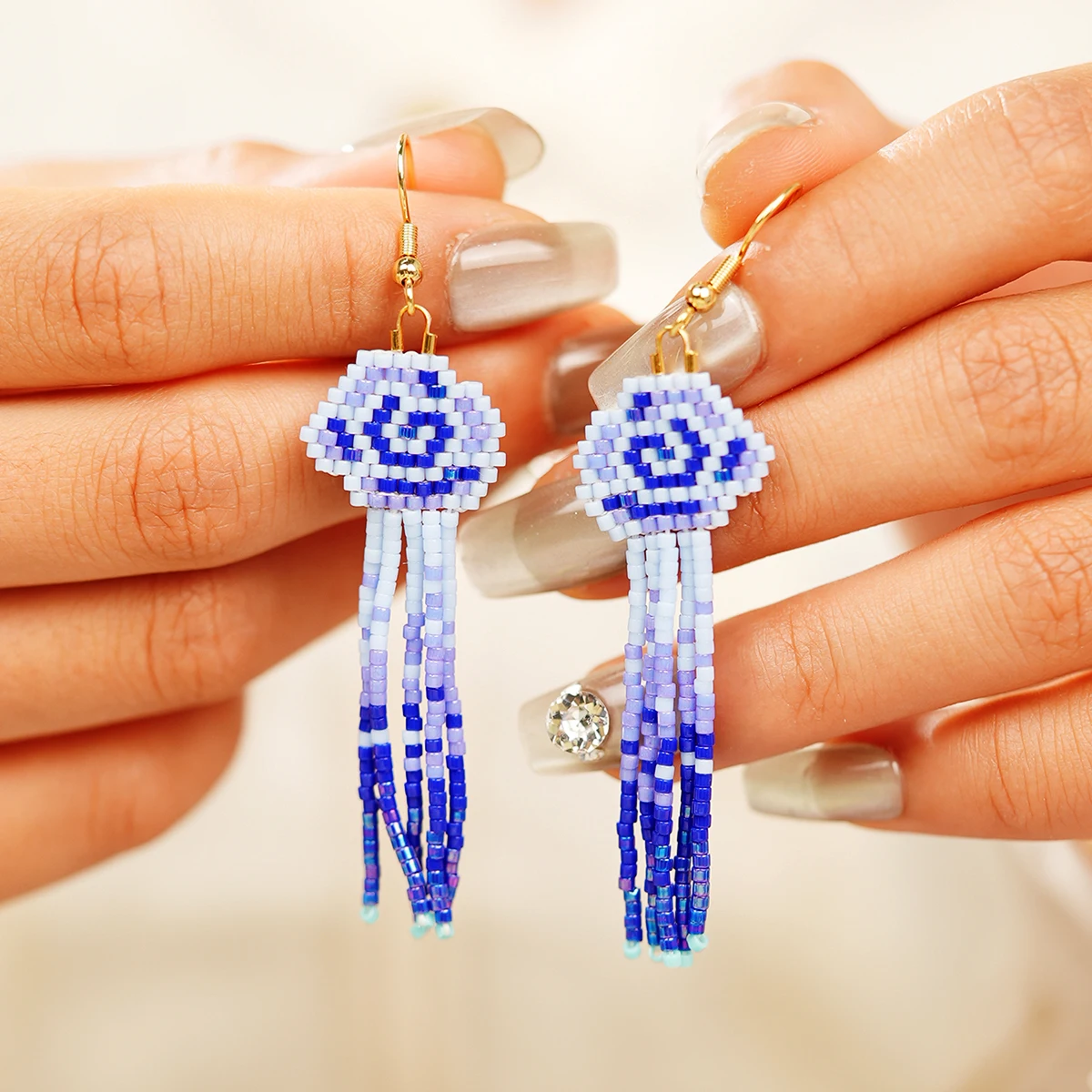 

ZGMXR Rice bead earrings Colorful clouds Tassels Bohemia Creativity Gradient color Hand weaving Alloy Female Beaded earrings